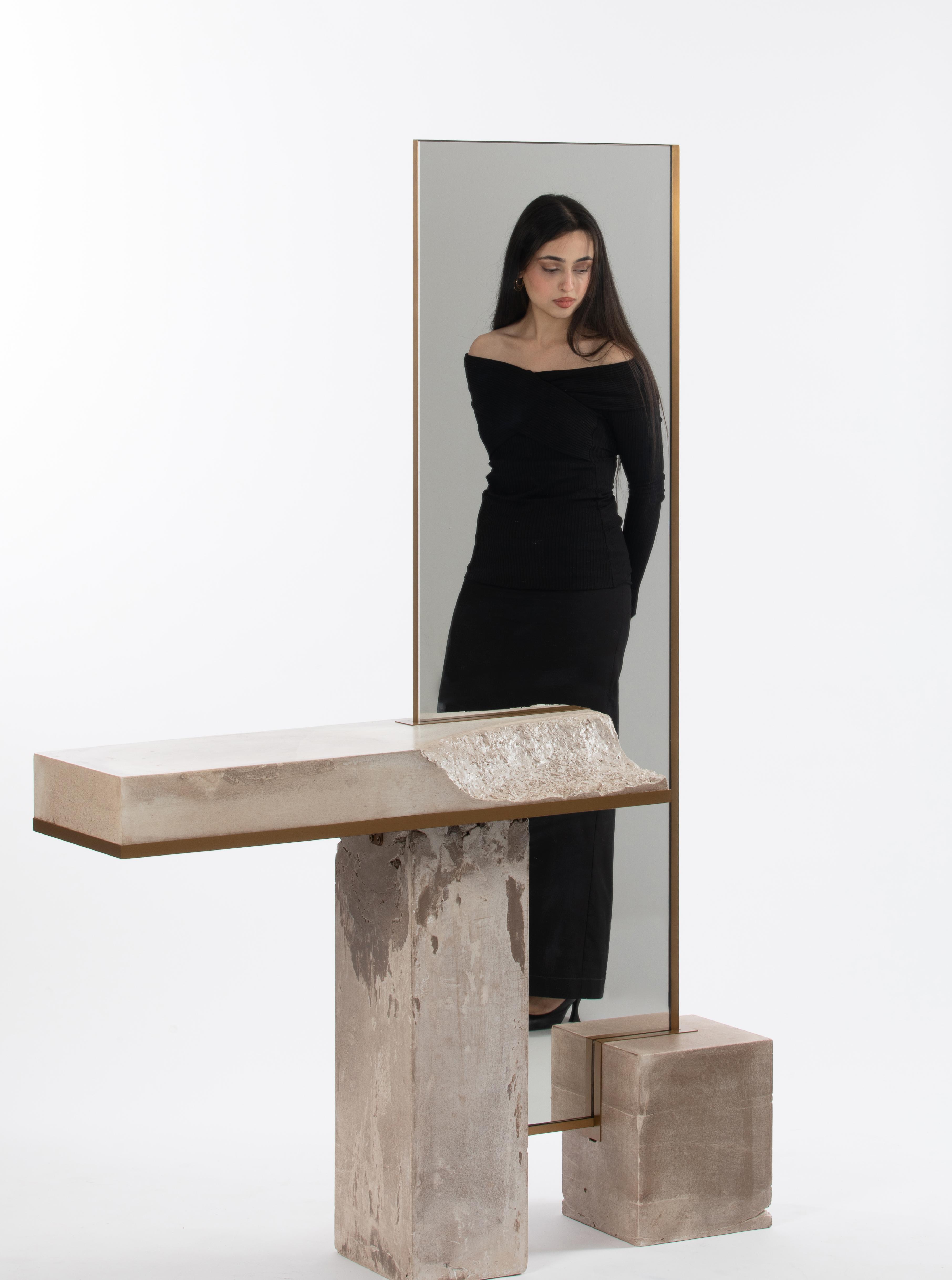Full shot of the Datecrete Console, with Sara Farha, one of the Datecrete co-founders, shown in the reflection on the console's mirror.