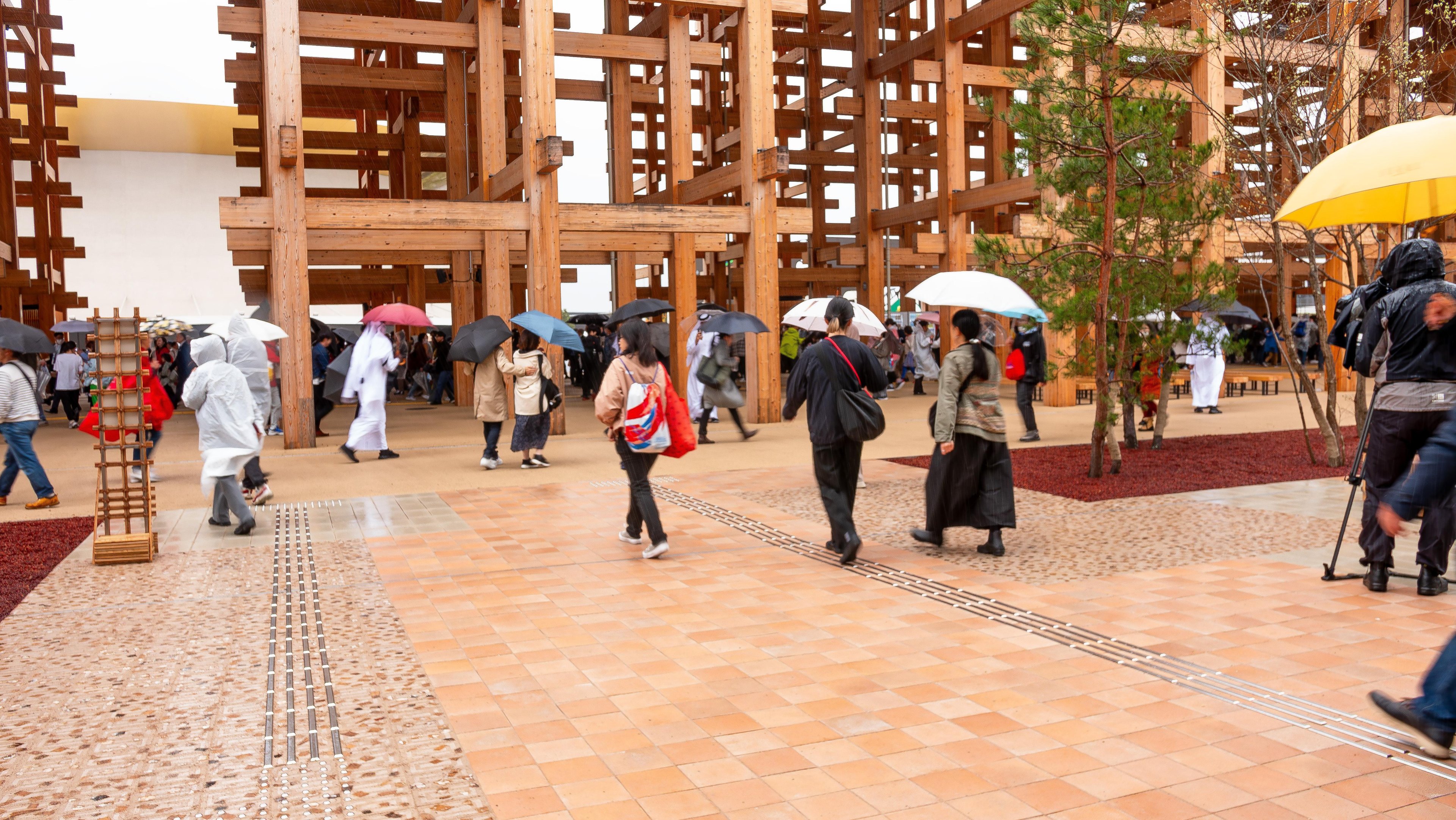 Pedestrians walking on the Datecrete pavers installed on the Osaka 2025 Expo floor.