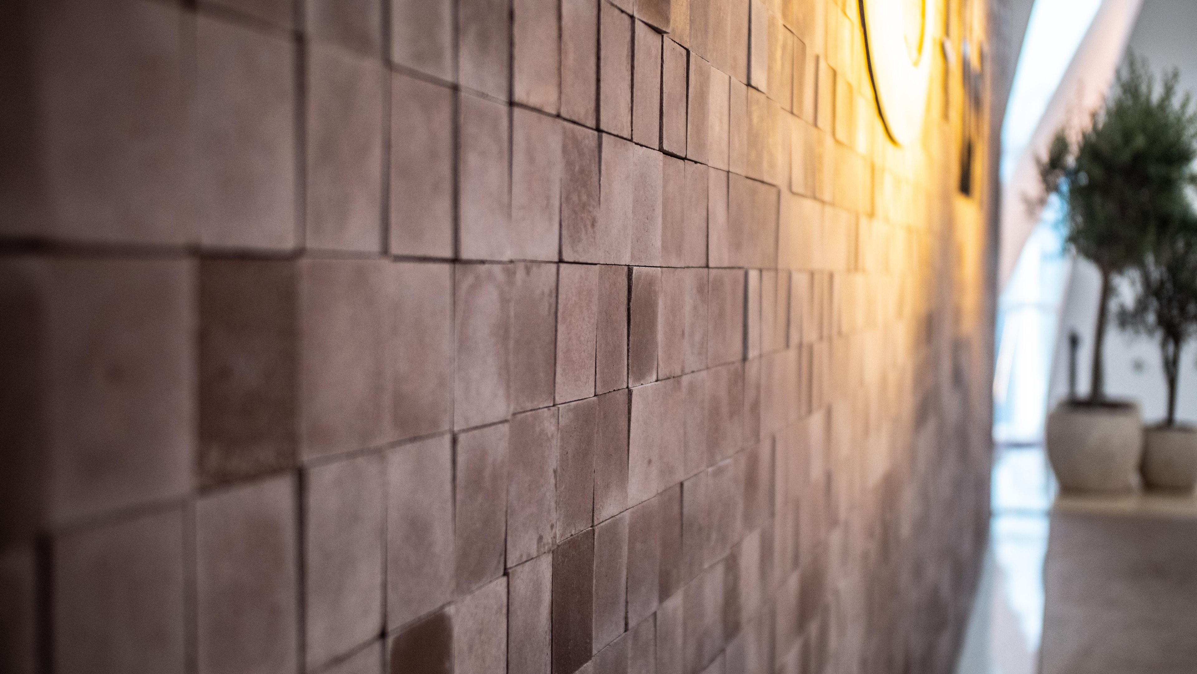 Extreme close up shot of the Datecrete tiles making up the backdrop.