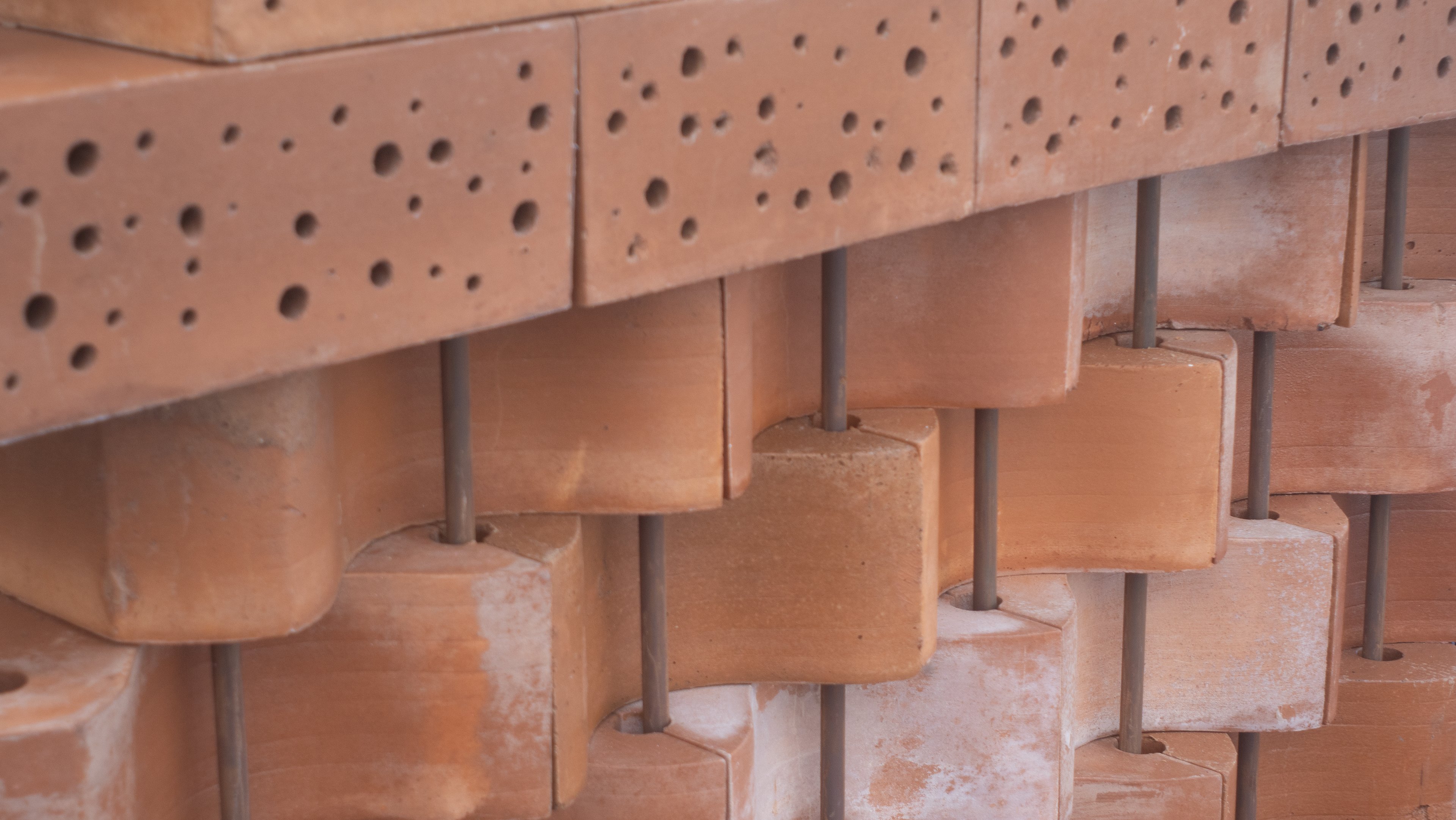 Close-up shot of the Datecrete Bee Hotel.